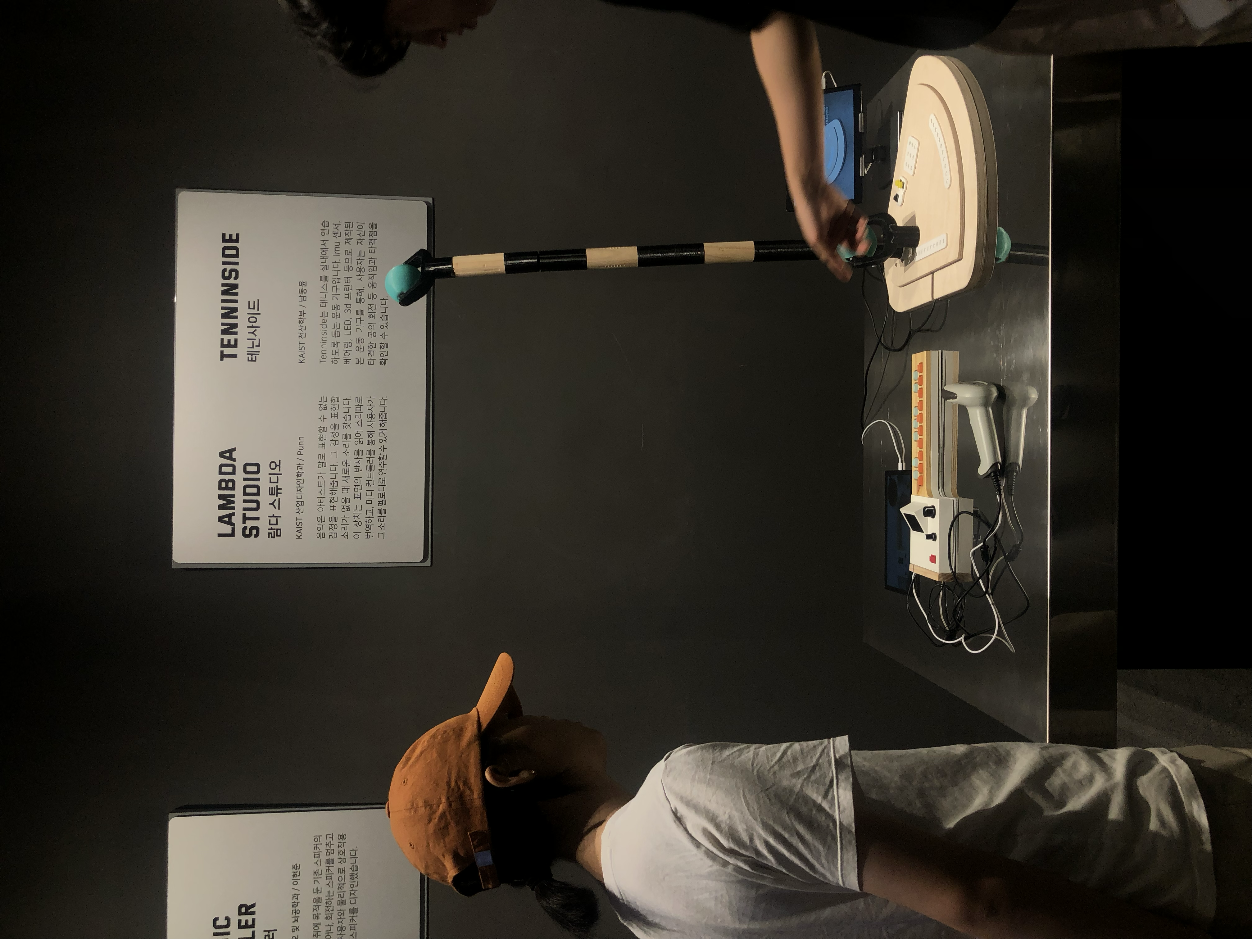 Close-up view of the exhibition display with furniture pieces