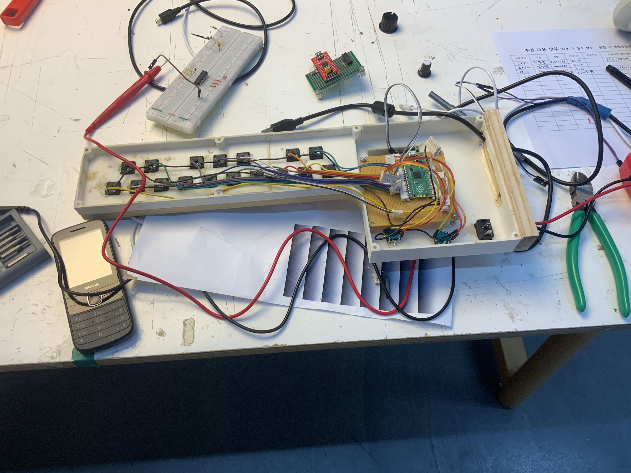 Close-up view of the exhibition display with furniture pieces